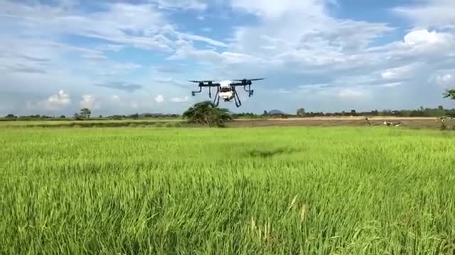 X4-10P agricultural spraying drone working in Thailand