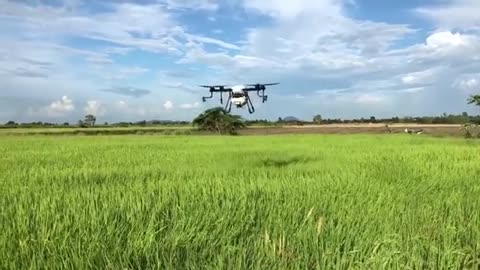 X4-10P agricultural spraying drone working in Thailand