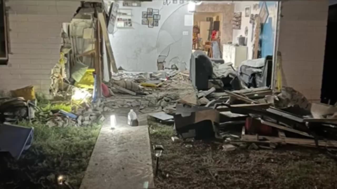 Couple Narrowly Escapes After Suspected Drunk Driver Plows Car into Their Home