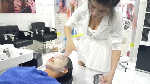 Vietnamese barber shop, Ms. Diem helps me wash hair and massage face