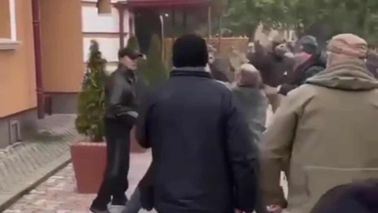 An old Orthodox priest judo throws a young Ukrainian neo-Nazi