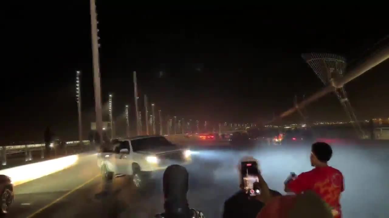 Raw video: Sideshow shuts down all eastbound traffic on Bay Bridge.