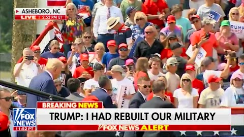 President Trump leaves the podium to hug a member of the crowd in North Carolina