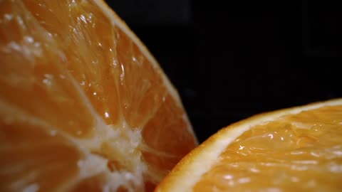 An Orange Fruit Cut In Half