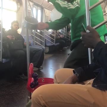 Subway magician does magic trick, bird comes out of empty cooking pan