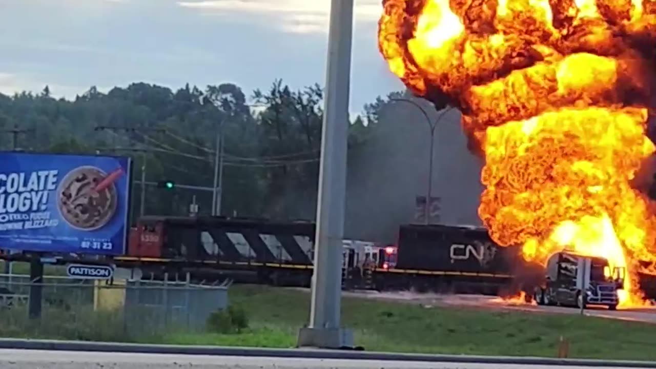 Fireball Engulfs Tanker After Train Collision