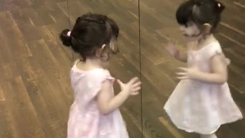 She knows she’s pretty in this dress