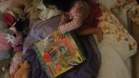 baby Abi and her toys