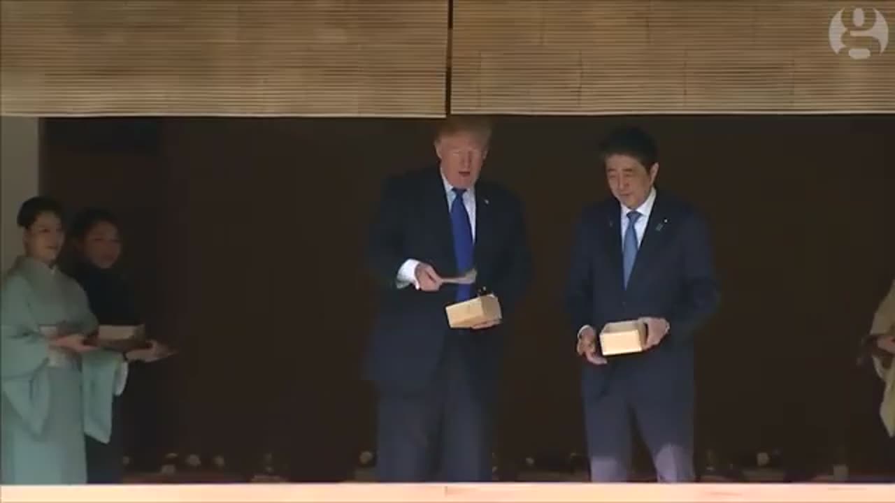 Trump and Shinzo Abe Feeding Fish