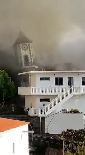 WATCH: The lava from volcano in La Palma has destroyed the church spire in Todoque