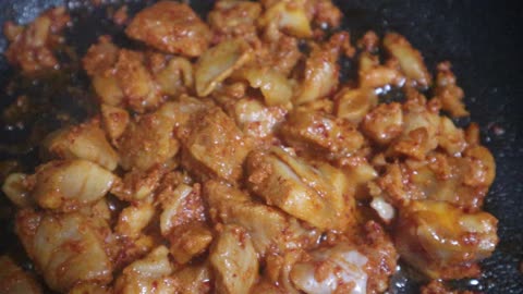 The spicy chicken is cooked deliciously in a frying pan