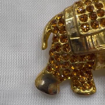 18KGP Elephant Crystal Brooch (1.75” x 1.25”). Made with Swarovski Crystal.