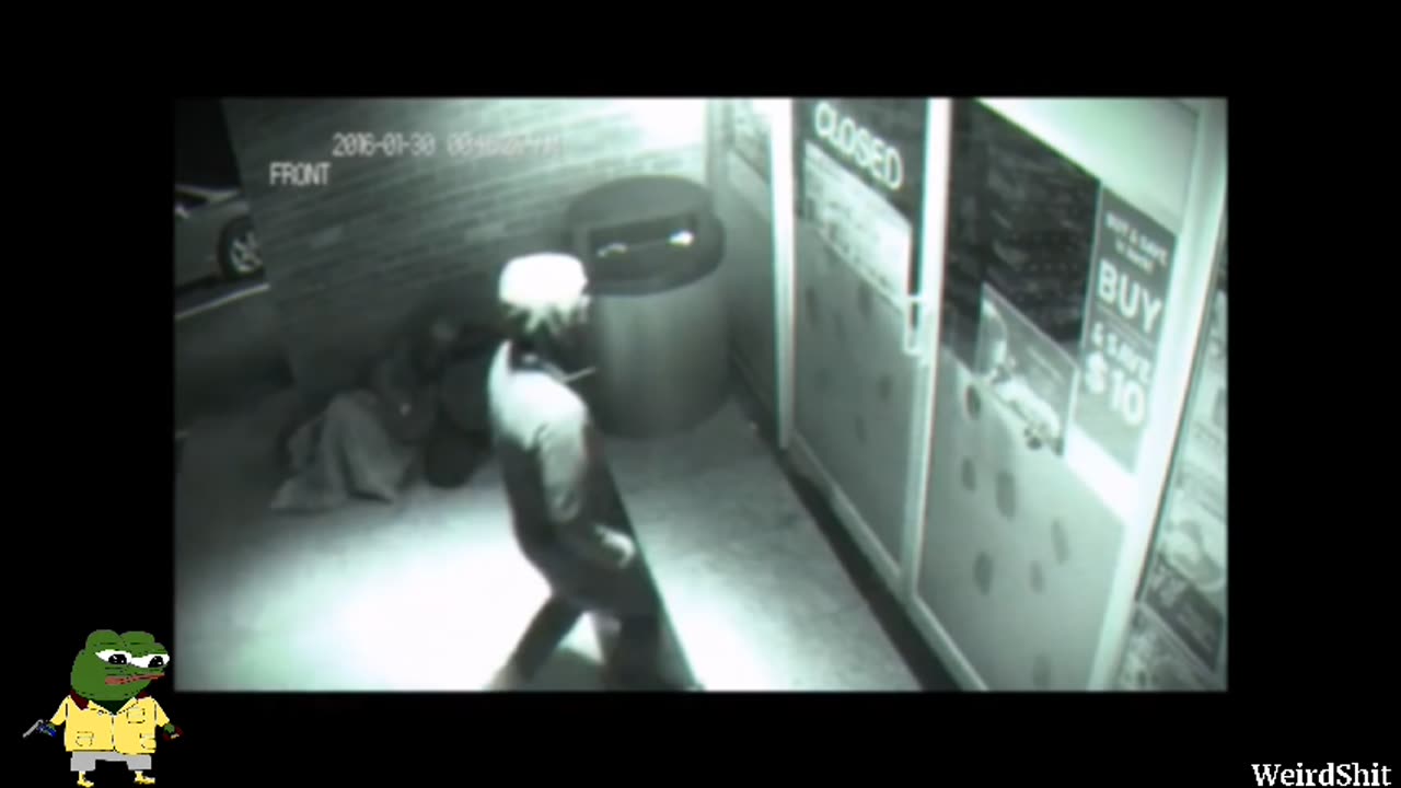 Man Caught In CCTV Going Through All..Can Be A Time Traveler Or Someone From Another Dimension?