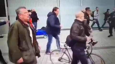 German Protesters Push Away Police. Officers Stand Down.