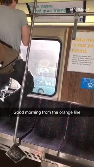 Guy black hat brown satchel pull ups subway train