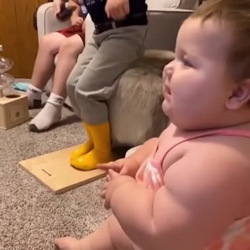Cute chubby baby dancing