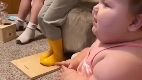Cute chubby baby dancing