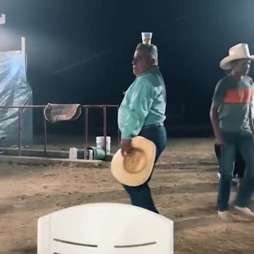 Guy dancing with beer on his head is a mood