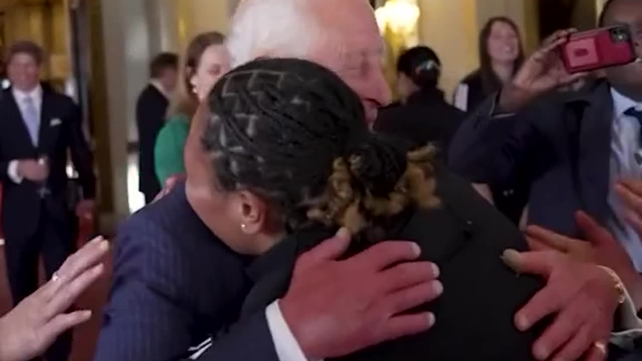 : King Charles beams as he gets group hug from Black Ferns rugby team