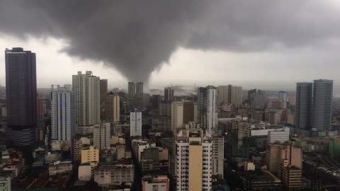 Tornado Over Buildings in Manila