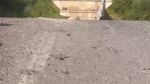 Russian Soldiers Looking for a Way Across Seim River After Bridge Destroyed by Ukrainian Airstrikes