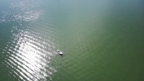 Drone bow landing on the water.