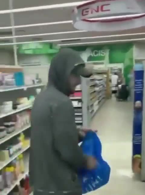 Man tries to rob a CVS, but a customer stops him.