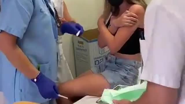 Girl Weeps and Wails Not Wanting COVID Shot As Nurses Force It On Her