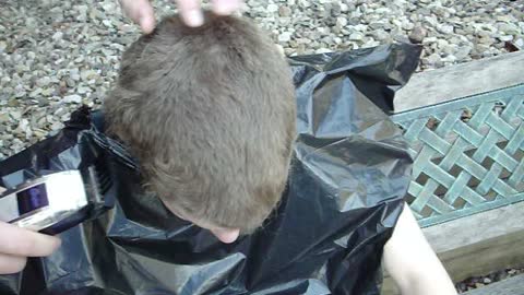 Nathan gets long hair shaved