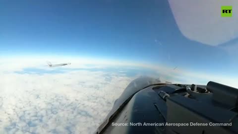 View "Russian buzzes USA pilot watching bomber Bear."