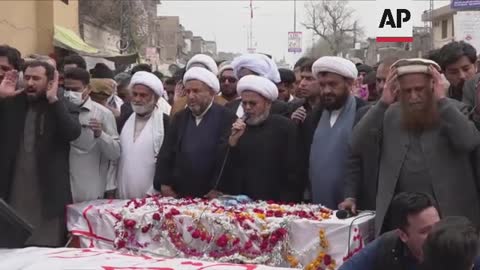 Funerals in Peshawar for bomb blast victims