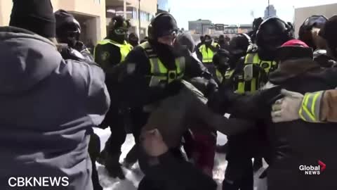 An Ottawa Police Officer Beats and Knee Thrusts an Already-Wounded Man to the Ground