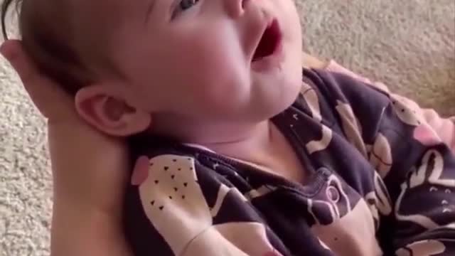 Cute newborn baby feeding nose's mom