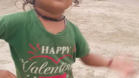 Small child playing and dancing