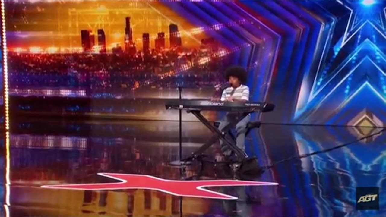 9-year-old journey is chading his dream by performing his original song titled "paradise"