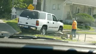 Car Stuck on Guard Rail After Failed Shortcut