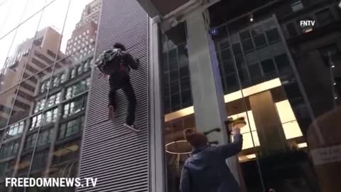 Hot Spiderman Left Wing Protestor FALLS While Trying to Climb NYC Building