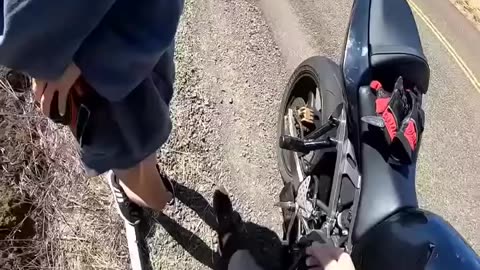 Crazy old man jumps in front of bike at 40mph!!! Then steals keys!