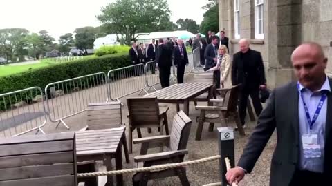 Bidens arrive for evening drinks at Cornwall bar