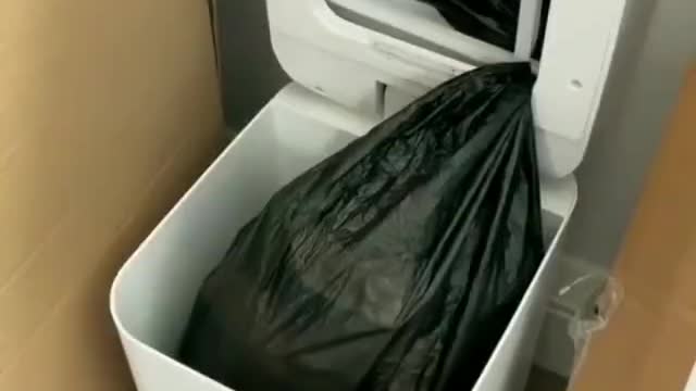 Automated dumpster
