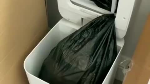Automated dumpster