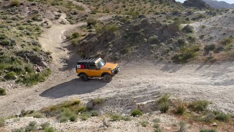 A 4x4 Montage going up small steep section