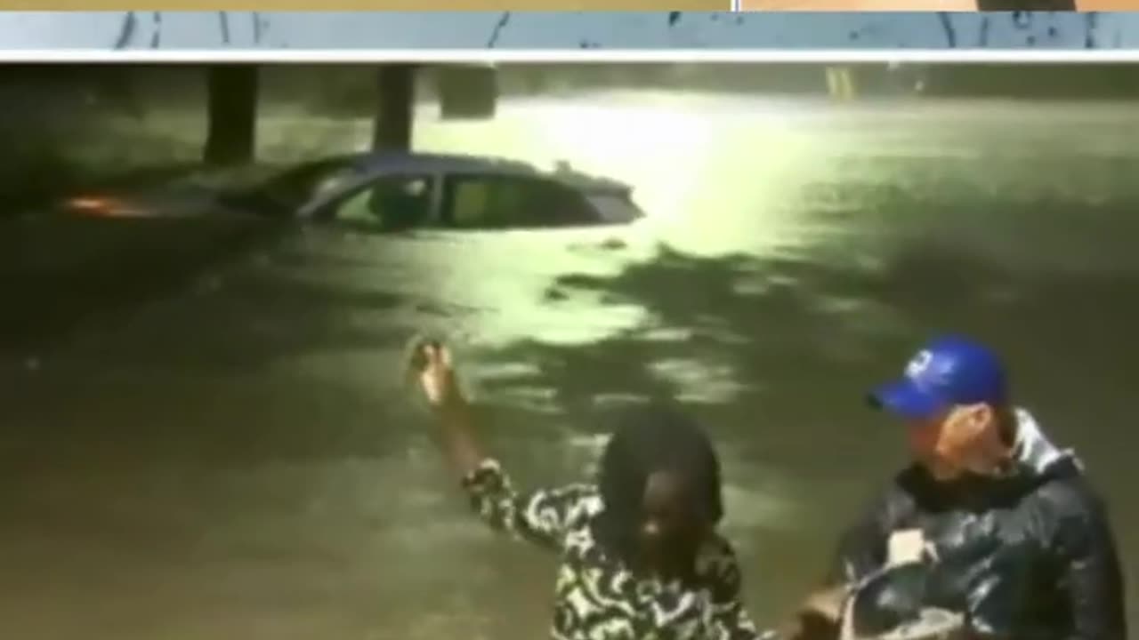 Fox Weather meteorologist rescues woman in chest-deep flooding as Helene slams the Southeast