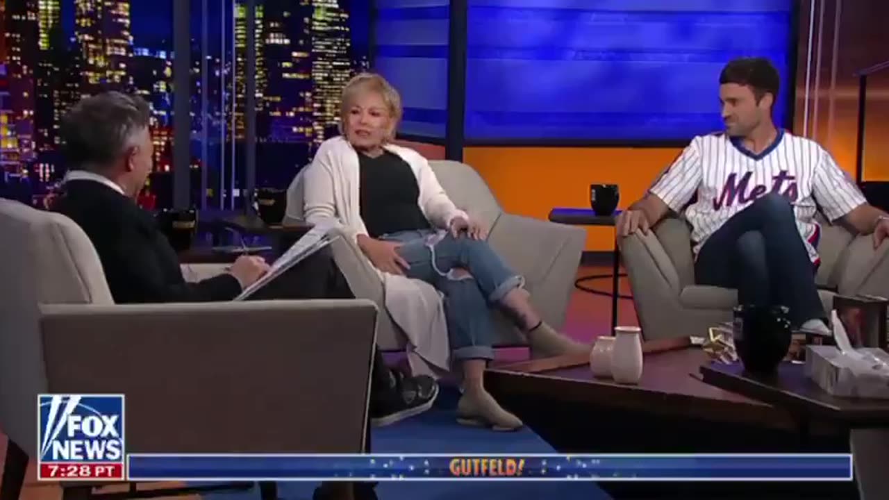 Roseanne Barr and Greg Gufield.