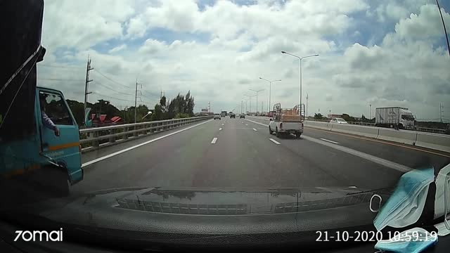 Stray Tire Stops Car in Middle of Freeway