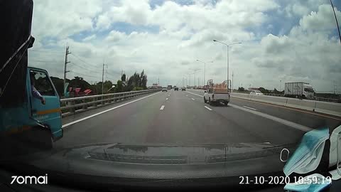 Stray Tire Stops Car in Middle of Freeway