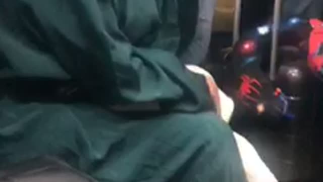 Woman falling asleep on bumpy subway train