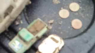 Old match box cars and coins