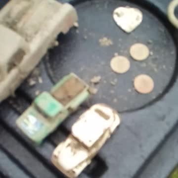 Old match box cars and coins