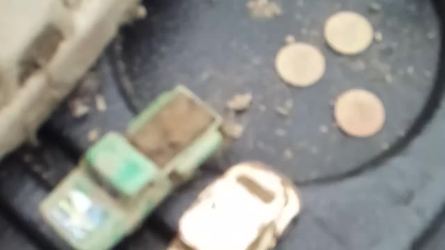 Old match box cars and coins